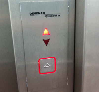 On the top floor there is one button which points upwards. Hardly intuitive. I want to go DOWN.